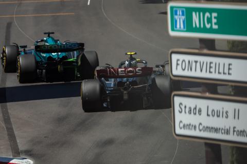 Lance Stroll (CDN) Aston Martin F1 Team AMR23 leads Lewis Hamilton (GBR) Mercedes AMG F1 W14. Formula 1 World