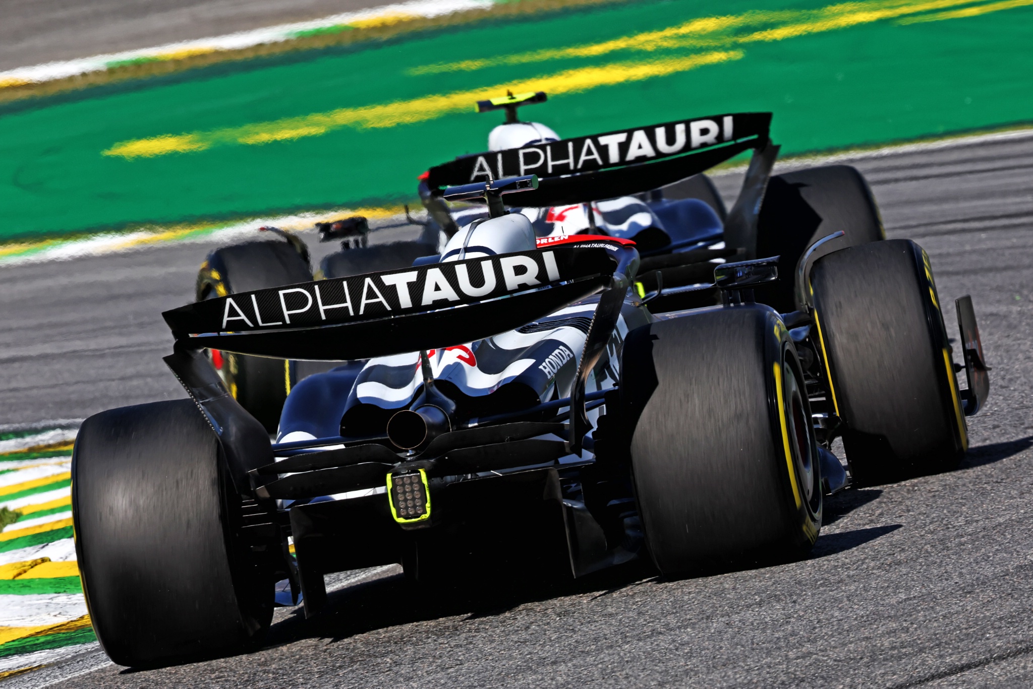 Daniel Ricciardo (AUS) AlphaTauri AT04 follows Yuki Tsunoda (JPN) AlphaTauri AT04. Formula 1 World Championship, Rd 21,